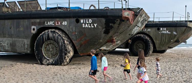Amphibious military vehicles land on Ocean City beach